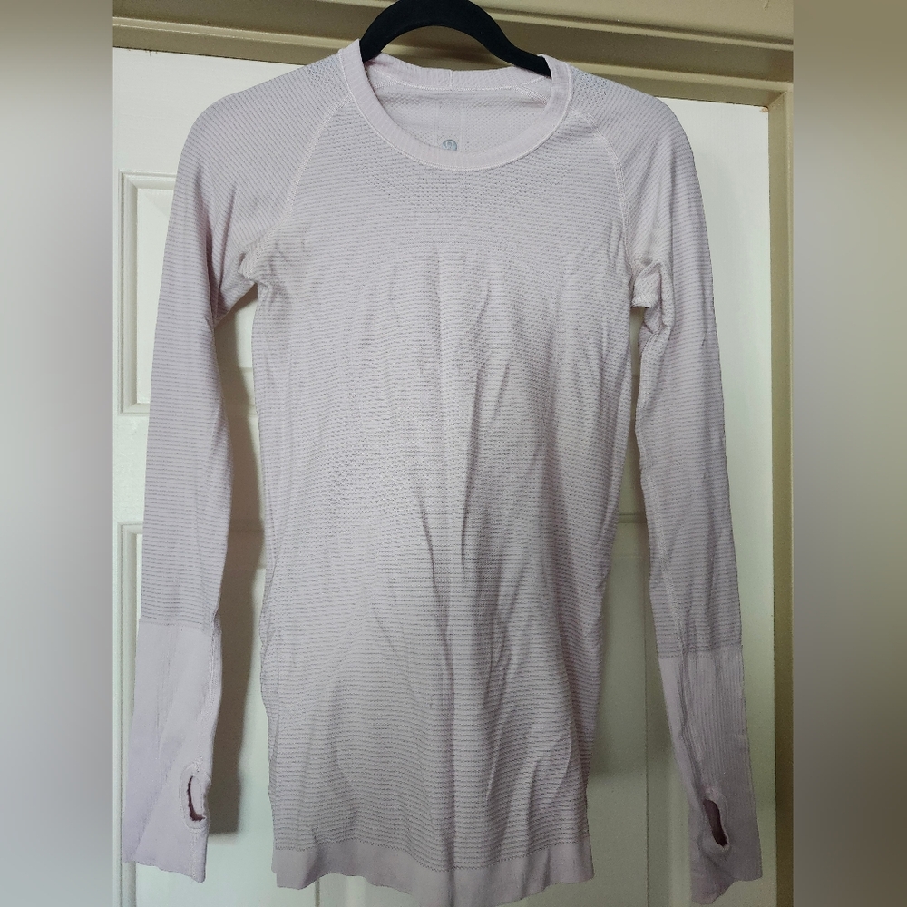 lululemon athletica pale pink,thumb hole, size Small.